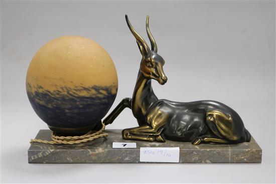 An Art Deco lamp mounted with a seated deer on marble stand W.30cm.